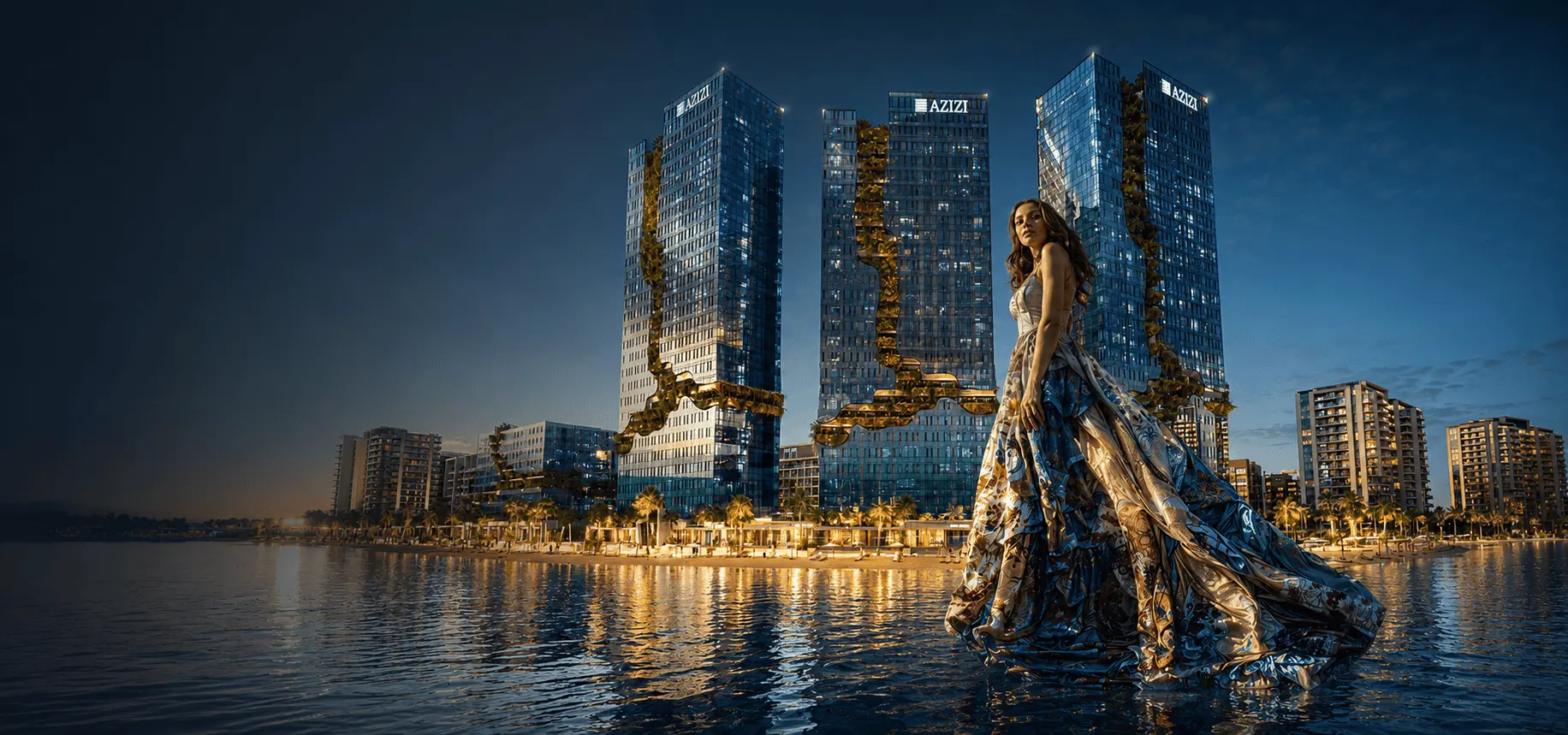 Woman in a gown stands on water with illuminated high-rise buildings behind her at dusk.